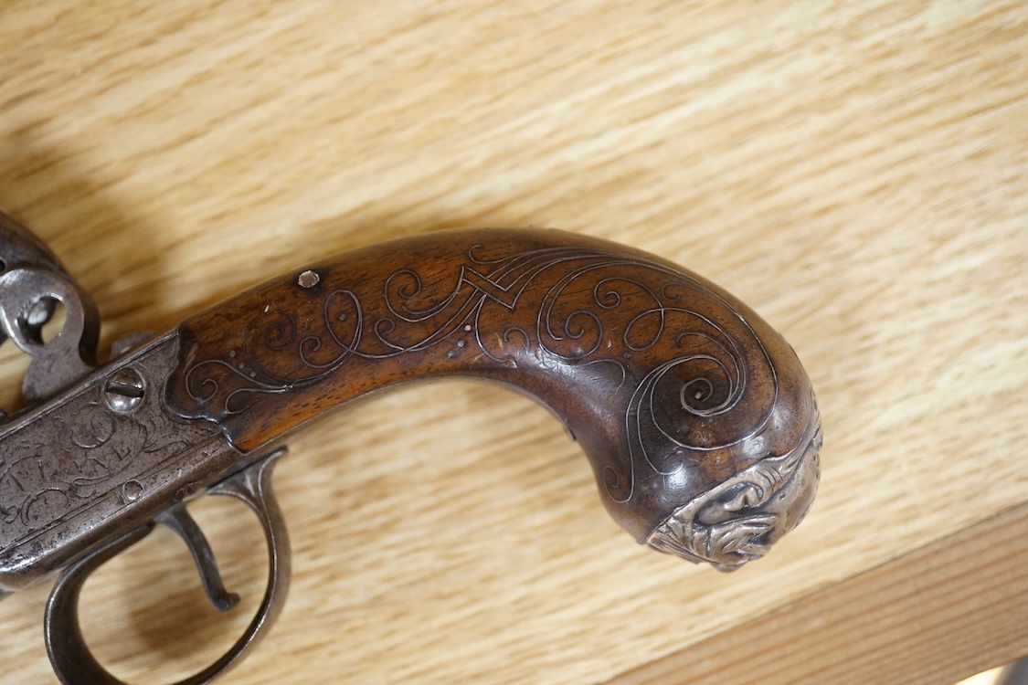 A Queen Anne style box lock flintlock travelling pistol, with turn off cannon barrel, 6cm, frame engraved; T. Lane, sliding trigger guard safety, rounded walnut grip with silver wire inlay and grotesque silver butt cap (